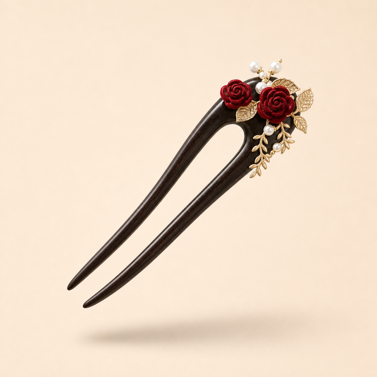 Camellia ebony hair fork floating at a 45-degree angle with soft shadow, showing a longer shape for secure buns and heavy hair


