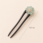 16.5cm green glaze flower ebony hair fork placed at a 45-degree angle with size marked in centimeters for medium and thick hair